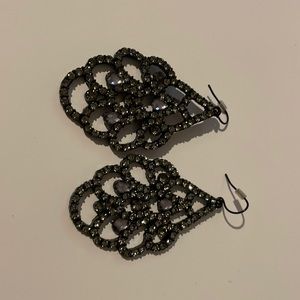 Costume jewelry- statement earrings. Black with silver stones